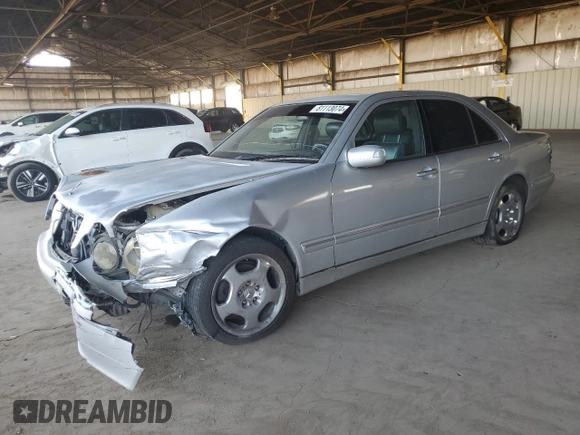 2001 Mercedes-Benz E-Class with VIN WDBJF70J51B167821, listed as a Copart auction lot 81113074 with 203,608 mi miles and Salvage Title. Bid and sale history available at carsss.com. Image 1.