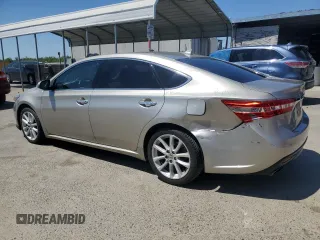 2015 Toyota Avalon Limited with VIN 4T1BK1EB4FU168949, listed as a Copart auction lot 56072295 with 203,687 mi miles and Salvage Title. Bid and sale history available at DreamBid. Image 2.