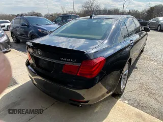 2012 BMW 7 Series 740Li with VIN WBAKB4C55CC576166, listed as a Copart auction lot 52448115 with 154,949 mi miles and Clean Title. Bid and sale history available at carsss.com. Image 4.