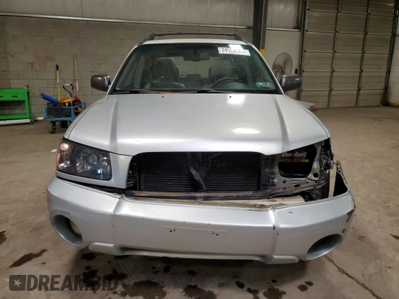 2003 Subaru Forester XS with VIN JF1SG65673H714885, listed as a Copart auction lot 74063684 with 298,649 mi miles and Salvage Title. Bid and sale history available at carsss.com. Image 5.