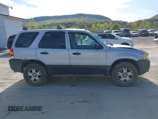 2006 Ford Escape XLT with VIN 1FMYU93126KC36402, listed as a IAAI auction lot 42122882 with 192,899 mi miles and . Bid and sale history available at DreamBid. Image 13.