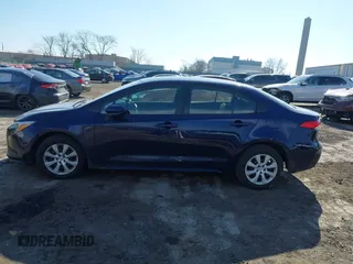 2023 Toyota Corolla Hybrid LE with VIN JTDBCMFE7PJ005985, listed as a IAAI auction lot 41574856 with 31,568 mi miles. Bid and sale history available at carsss.com. Image 14.