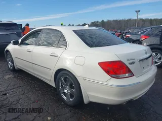 2006 Acura RL z VIN JH4KB16546C002058, wystawiony jako IAAI lot #41286711 z przebiegiem 297 234 mil mil oraz . Historia ofert i sprzedaży dostępna na DreamBid. Obrazek 14.