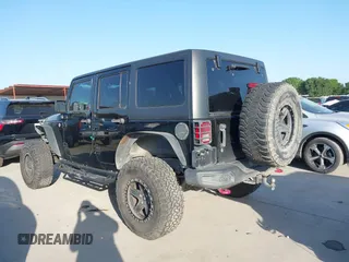 2015 Jeep Wrangler Unlimited Rubicon Hard Rock with VIN 1C4HJWFG7FL602344, listed as a IAAI auction lot 42011914 with 109,238 mi miles and . Bid and sale history available at DreamBid. Image 14.