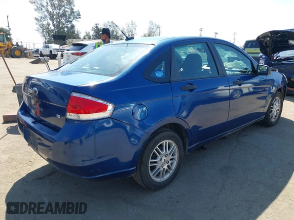 2009 Ford Focus SE with VIN 1FAHP35N99W225537, listed as a IAAI auction lot 41960881 with 108,301 mi miles. Bid and sale history available at carsss.com. Image 4.