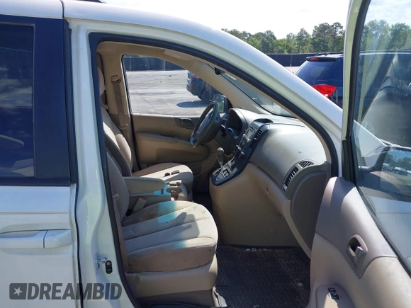 2012 Kia Sedona LX with VIN KNDMG4C71C6447550, listed as a IAAI auction lot 42190357 with 161,960 mi miles. Bid and sale history available at carsss.com. Image 5.