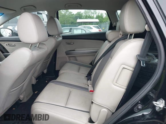 2012 Mazda CX-9 Grand Touring z VIN JM3TB2DAXC0338667, wystawiony jako IAAI lot #42260820 z przebiegiem 138 111 mil mil oraz . Historia ofert i sprzedaży dostępna na DreamBid. Obrazek 8.