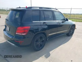 2013 Mercedes-Benz GLK with VIN WDCGG5HB2DF990806, listed as a IAAI auction lot 42047198 with 130,728 mi miles. Bid and sale history available at carsss.com. Image 4.