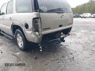 2004 Chevrolet Tahoe LT z VIN 1GNEC13Z04R309134, wystawiony jako IAAI lot #41747014 z przebiegiem Nie podano mil oraz . Historia ofert i sprzedaży dostępna na DreamBid. Obrazek 6.