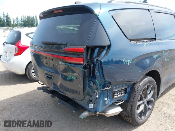 2023 Chrysler Pacifica Limited with VIN 2C4RC3GGXPR555282, listed as a IAAI auction lot 42452848 with 18,373 mi miles and . Bid and sale history available at DreamBid. Image 6.
