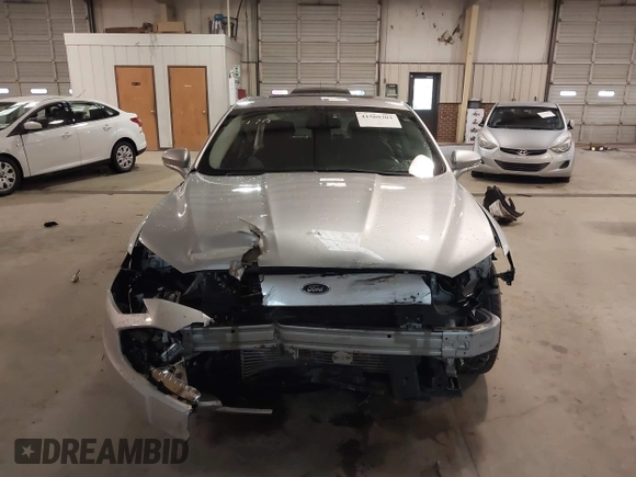 2017 Ford Fusion SE z VIN 3FA6P0H95HR203170, wystawiony jako IAAI lot #41569303 z przebiegiem 143 287 mil mil oraz . Historia ofert i sprzedaży dostępna na DreamBid. Obrazek 13.