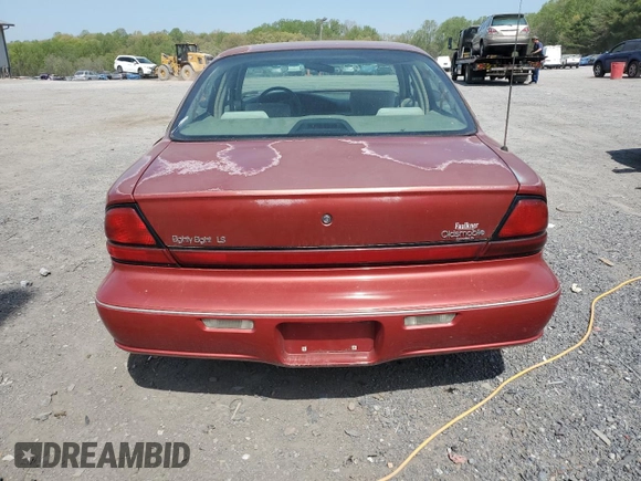 1998 Oldsmobile 88 LS z VIN 1G3HN52K2W4809677, wystawiony jako Copart lot #54331535 z przebiegiem 99 587 mil mil oraz Szkody całkowita. Historia ofert i sprzedaży dostępna na DreamBid. Obrazek 6.
