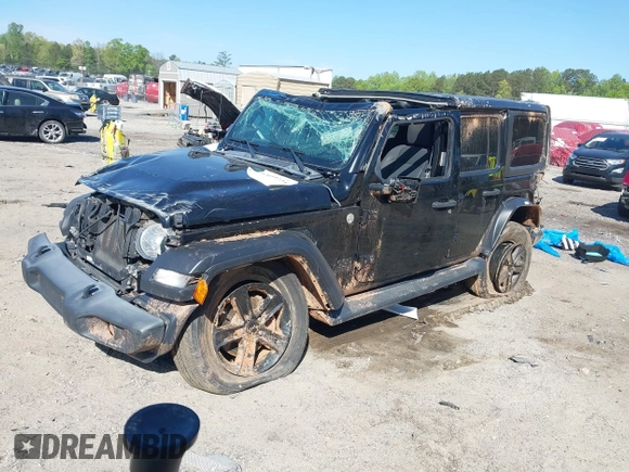 2019 Jeep Wrangler Unlimited Sport S with VIN 1C4HJXDG7KW671598, listed as a IAAI auction lot 42059734 with 63,899 mi miles and . Bid and sale history available at DreamBid. Image 17.