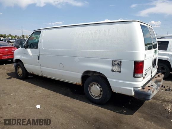 1999 Ford Econoline Cargo with VIN 1FTRE1429XHA29986, listed as a Copart auction lot 70331004 with 312,901 mi miles and Non Repairable. Bid and sale history available at carsss.com. Image 2.