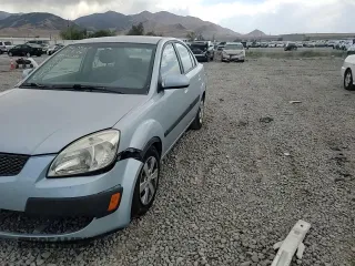 2009 Kia Rio LX with VIN KNADE223496469797, listed as a Copart auction lot 71005774 with 130,675 mi miles and Salvage Title. Bid and sale history available at DreamBid. Image 11.