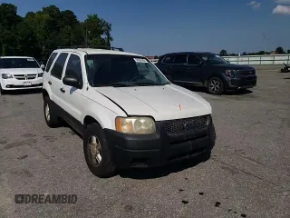 2004 Ford Escape XLS with VIN 1FMYU021X4DA07352, listed as a Copart auction lot 68909864 with 275,776 mi miles and Salvage Title. Bid and sale history available at DreamBid. Image 12.