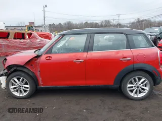 2013 MINI Cooper Countryman with VIN WMWZB3C57DWM07565, listed as a IAAI auction lot 41655938 with 62,694 mi miles. Bid and sale history available at carsss.com. Image 14.