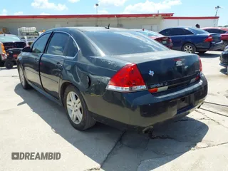2014 Chevrolet Impala LT with VIN 2G1WB5E31E1106255, listed as a IAAI auction lot 41960424 with 235,070 mi miles and . Bid and sale history available at DreamBid. Image 3.