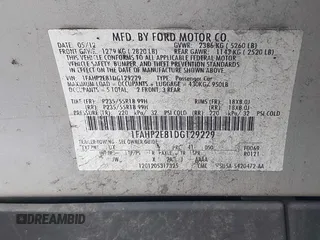 2013 Ford Taurus SEL with VIN 1FAHP2E81DG129229, listed as a IAAI auction lot 41898917 with 205,865 mi miles. Bid and sale history available at carsss.com. Image 9.