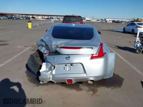 2014 Nissan 370Z Nismo with VIN JN1AZ4EHXEM634418, listed as a IAAI auction lot 41308580 with 84,074 mi miles and . Bid and sale history available at DreamBid. Image 16.