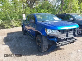 2018 Chevrolet Colorado 4WD Z71 z VIN 1GCGTDEN6J1195082, wystawiony jako IAAI lot #42158668 z przebiegiem 75 631 mil mil oraz . Historia ofert i sprzedaży dostępna na DreamBid. Obrazek 1.