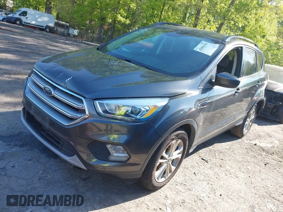 2017 Ford Escape SE z VIN 1FMCU0GDXHUB66813, wystawiony jako IAAI lot #42056150 z przebiegiem 86 915 mil mil oraz . Historia ofert i sprzedaży dostępna na DreamBid. Obrazek 22.