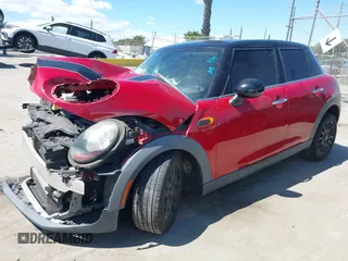 2017 MINI Hardtop 4 Door Cooper z VIN WMWXU1C57H2E18670, wystawiony jako IAAI lot #41950314 z przebiegiem 94 199 mil mil oraz . Historia ofert i sprzedaży dostępna na DreamBid. Obrazek 18.