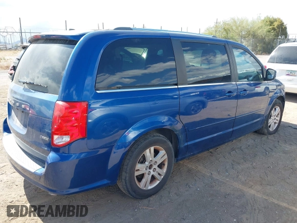 2011 Dodge Grand Caravan Crew with VIN 2D4RN5DG1BR711795, listed as a IAAI auction lot 42202899 with 185,524 mi miles and . Bid and sale history available at DreamBid. Image 4.