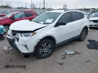 2017 Toyota RAV4 LE with VIN JTMZFREV1HJ103223, listed as a IAAI auction lot 41571466 with 96,860 mi miles and . Bid and sale history available at carsss.com. Image 2.