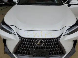 2025 Lexus NX 350 Premium with VIN JTJGGCEZ4S5010472, listed as a Copart auction lot 54560975 with 9,587 mi miles and Salvage title. Bid and sale history available at DreamBid. Image 12.