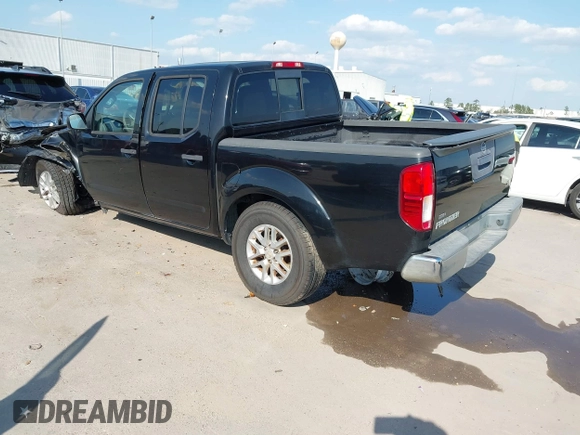 2014 Nissan Frontier SV with VIN 1N6AD0ER5EN745740, listed as a IAAI auction lot 41864104 with 161,303 mi miles and . Bid and sale history available at DreamBid. Image 3.