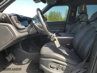 2023 Rivian R1T Adventure with VIN 7FCTGAAA1PN020979, listed as a Copart auction lot 52574025 with 0 mi miles and Salvage Title. Bid and sale history available at carsss.com. Image 7.