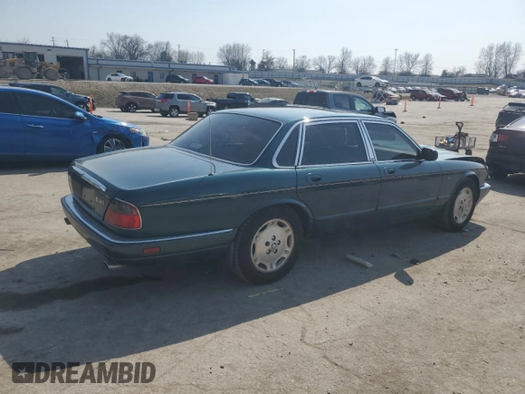 1996 Jaguar XJ z VIN SAJHX1746TC756451, wystawiony jako Copart lot #48991655 z przebiegiem 115 015 mil mil oraz Szkoda całkowita • Salvage title. Historia ofert i sprzedaży dostępna na DreamBid. Obrazek 3.