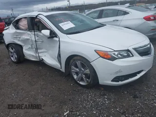 2014 Acura ILX Technology z VIN 19VDE1F75EE012228, wystawiony jako IAAI lot #41958455 z przebiegiem 102 085 mil mil oraz . Historia ofert i sprzedaży dostępna na DreamBid. Obrazek 1.