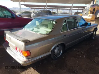 1990 Mercedes-Benz 560 with VIN WDBCA39E7LA505668, listed as a IAAI auction lot 41473380 with 159,716 mi miles and . Bid and sale history available at DreamBid. Image 4.