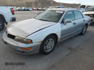 2000 Mitsubishi Diamante LS z VIN 6MMAP67P5YT006608, wystawiony jako Copart lot #49009455 z przebiegiem 241 503 mil mil oraz Tytuł czysty. Historia ofert i sprzedaży dostępna na DreamBid. Obrazek 1.
