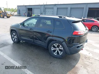 2015 Jeep Cherokee Trailhawk with VIN 1C4PJMBS6FW786622, listed as a IAAI auction lot 42403215 with 148,205 mi miles and . Bid and sale history available at DreamBid. Image 3.