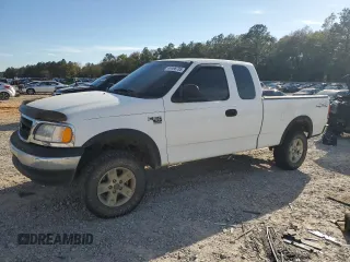 2003 Ford F-150 XL with VIN 1FTRX18L13NB64579, listed as a Copart auction lot 49496705 with 258,499 mi miles and Salvage Title. Bid and sale history available at carsss.com. Image 1.