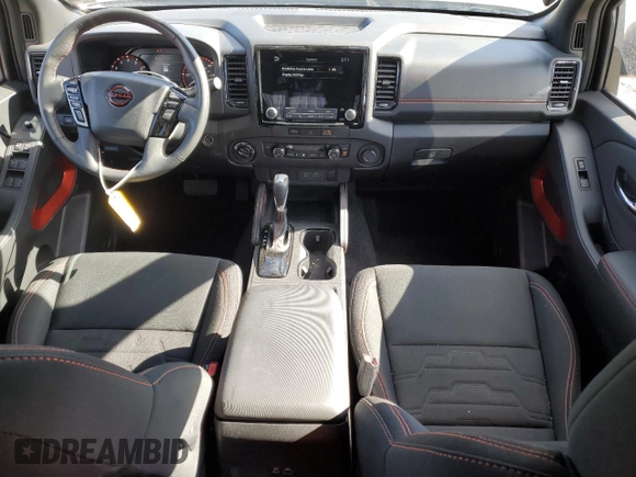 2024 Nissan Frontier Pro-4X with VIN 1N6ED1EK2RN656885, listed as a Copart auction lot 46604165 with 4,390 mi miles and Salvage title. Bid and sale history available at DreamBid. Image 8.