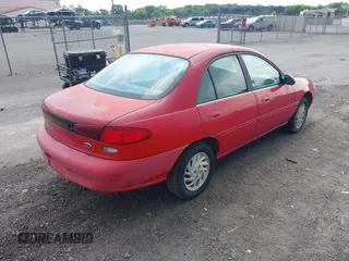 1997 Ford Escort LX with VIN 1FALP13P1VW418844, listed as a IAAI auction lot 42583584 with 145,463 mi miles and . Bid and sale history available at DreamBid. Image 4.
