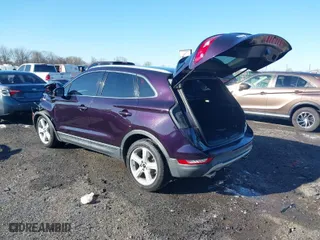 2015 Lincoln MKC with VIN 5LMCJ1A97FUJ18148, listed as a IAAI auction lot 41806694 with 69,677 mi miles. Bid and sale history available at carsss.com. Image 3.
