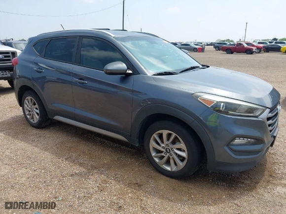 2017 Hyundai Tucson SE Plus with VIN KM8J33A42HU375273, listed as a IAAI auction lot 41900474 with 124,658 mi miles. Bid and sale history available at carsss.com. Image 1.