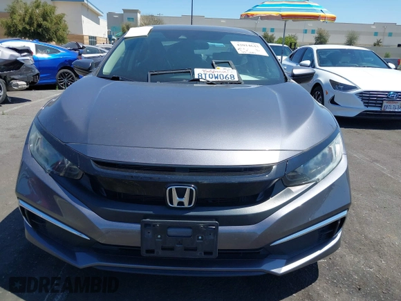 2020 Honda Civic LX z VIN 2HGFC2F68LH529688, wystawiony jako IAAI lot #42014643 z przebiegiem 43 441 mil mil oraz . Historia ofert i sprzedaży dostępna na DreamBid. Obrazek 13.