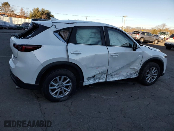 2023 Mazda CX-5 2.5 S with VIN JM3KFBAM6P0269481, listed as a Copart auction lot 87222194 with 21,070 mi miles and Salvage Title. Bid and sale history available at carsss.com. Image 3.