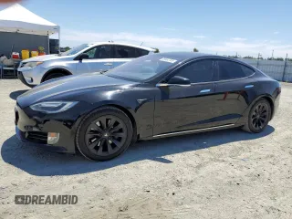 2017 Tesla Model S 60 z VIN 5YJSA1E15HF219286, wystawiony jako Copart lot #66682705 z przebiegiem 44 923 mil mil oraz Szkoda całkowita • Salvage title. Historia ofert i sprzedaży dostępna na DreamBid. Obrazek 1.