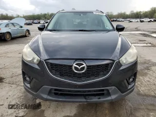 2014 Mazda CX-5 Touring with VIN JM3KE2CY8E0424757, listed as a Copart auction lot 54703195 with 111,401 mi miles and Salvage Title. Bid and sale history available at DreamBid. Image 5.