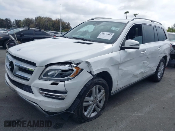 2014 Mercedes-Benz GL 450 z VIN 4JGDF7CE0EA424081, wystawiony jako IAAI lot #42359465 z przebiegiem 145 363 mil mil oraz . Historia ofert i sprzedaży dostępna na DreamBid. Obrazek 6.