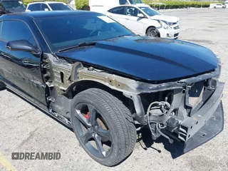 2013 Chevrolet Camaro LT z VIN 2G1FC1E30D9128690, wystawiony jako IAAI lot #41856470 z przebiegiem 139 573 mil mil oraz . Historia ofert i sprzedaży dostępna na DreamBid. Obrazek 6.