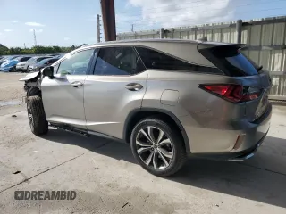 2020 Lexus RX 350L with VIN JTJHZKEA1L2015764, listed as a Copart auction lot 58324465 with 54,860 mi miles and Salvage title. Bid and sale history available at DreamBid. Image 2.