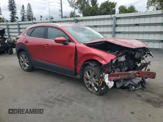 2021 Mazda CX-30 Premium with VIN 3MVDMADL1MM319635, listed as a Copart auction lot 48482585 with 21,192 mi miles and Salvage title. Bid and sale history available at DreamBid. Image 4.